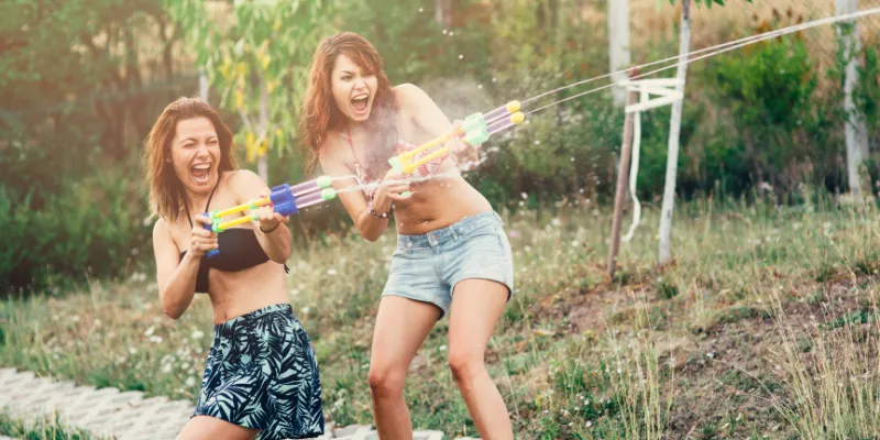 peopel having a water gun fight as the best bicpic game ever